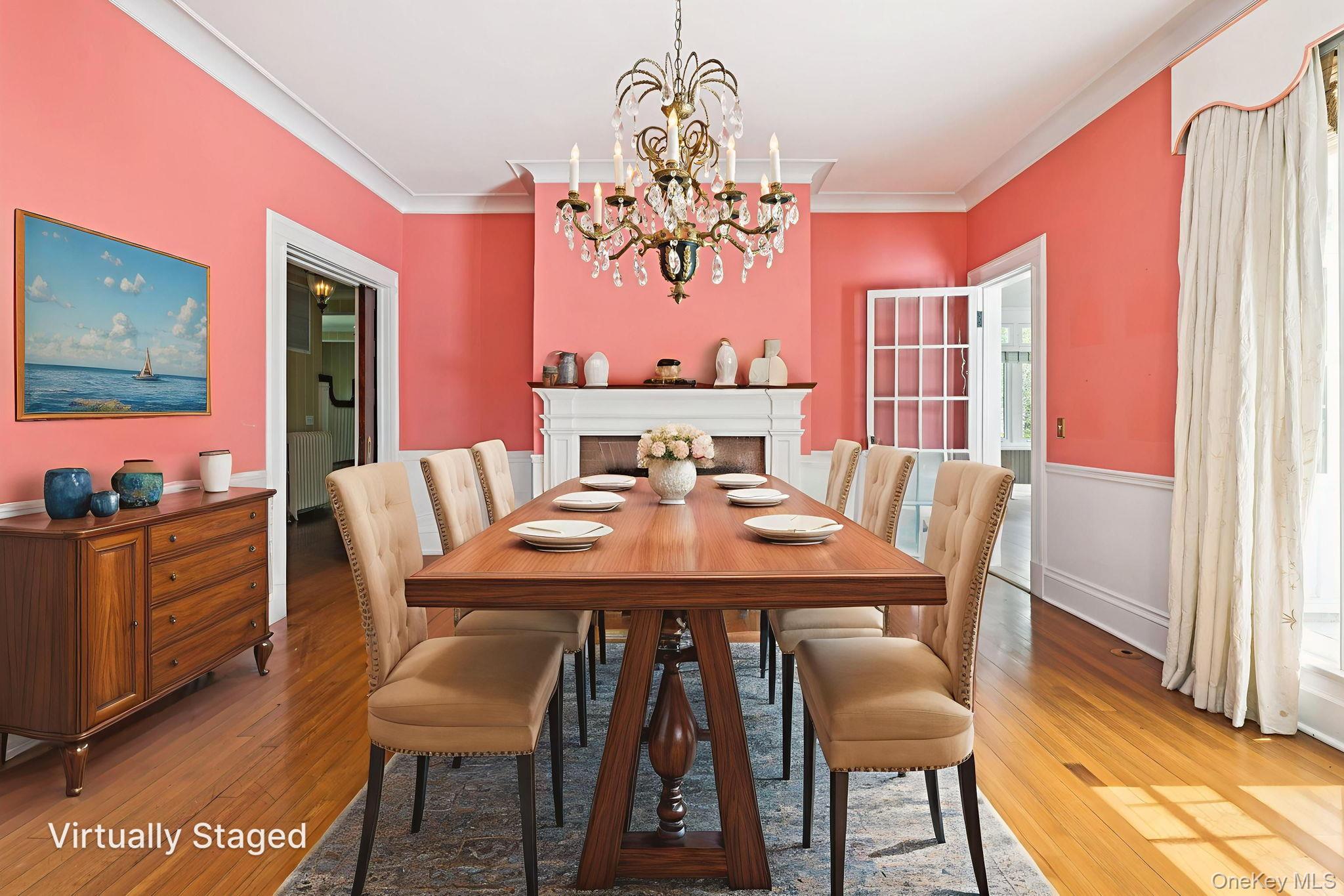 90 Thompson Avenue Babylon, NY 11702 - Photo 10 of 35 Dining room with light wood-type flooring, ornamental molding, and a chandelier