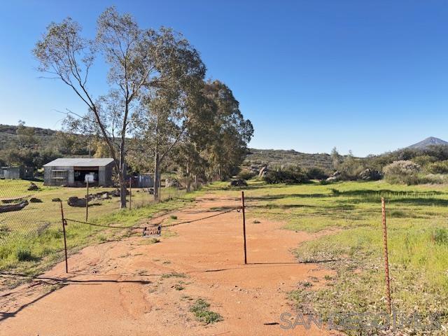1 Grapevine Ranch Road Potrero, CA 91963 - Photo 1 of 4 a view of a lake with a yard