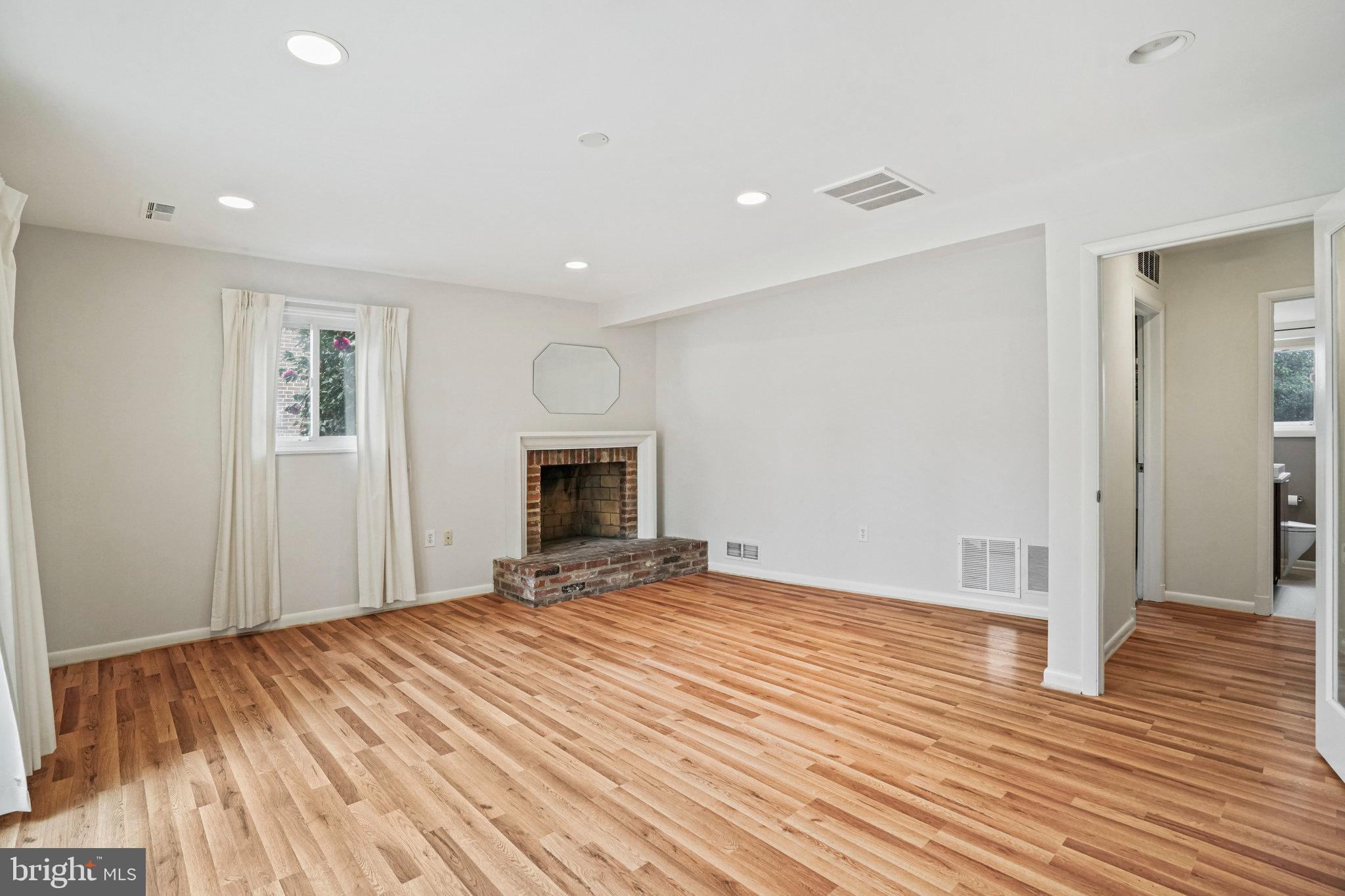 10002 Belhaven Road Bethesda, MD 20817 - Photo 25 of 31 Family Room With Fireplace