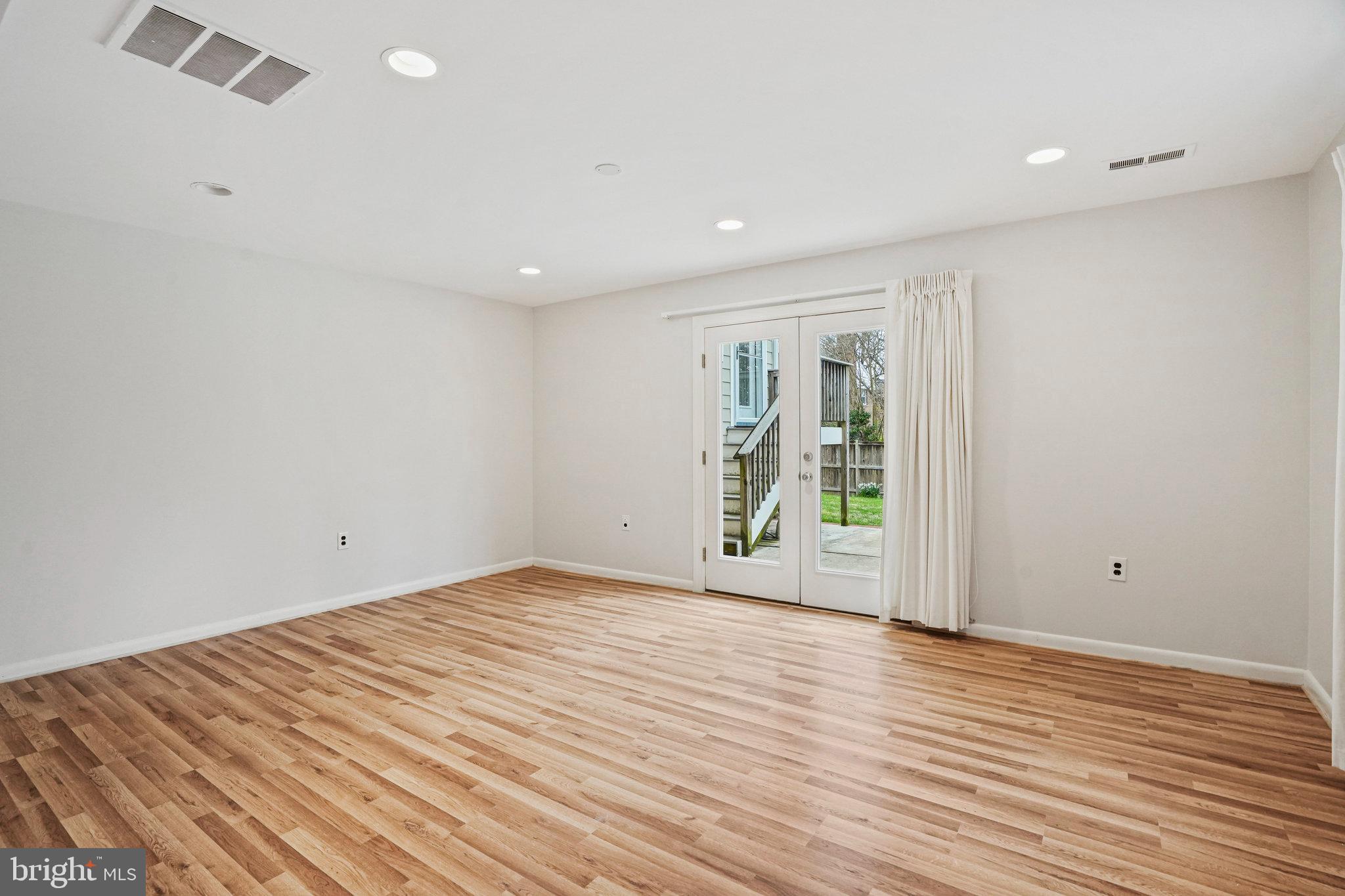 10002 Belhaven Road Bethesda, MD 20817 - Photo 26 of 31 Family Room With Exterior Exit