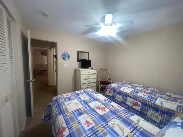 a view of a house with a tree