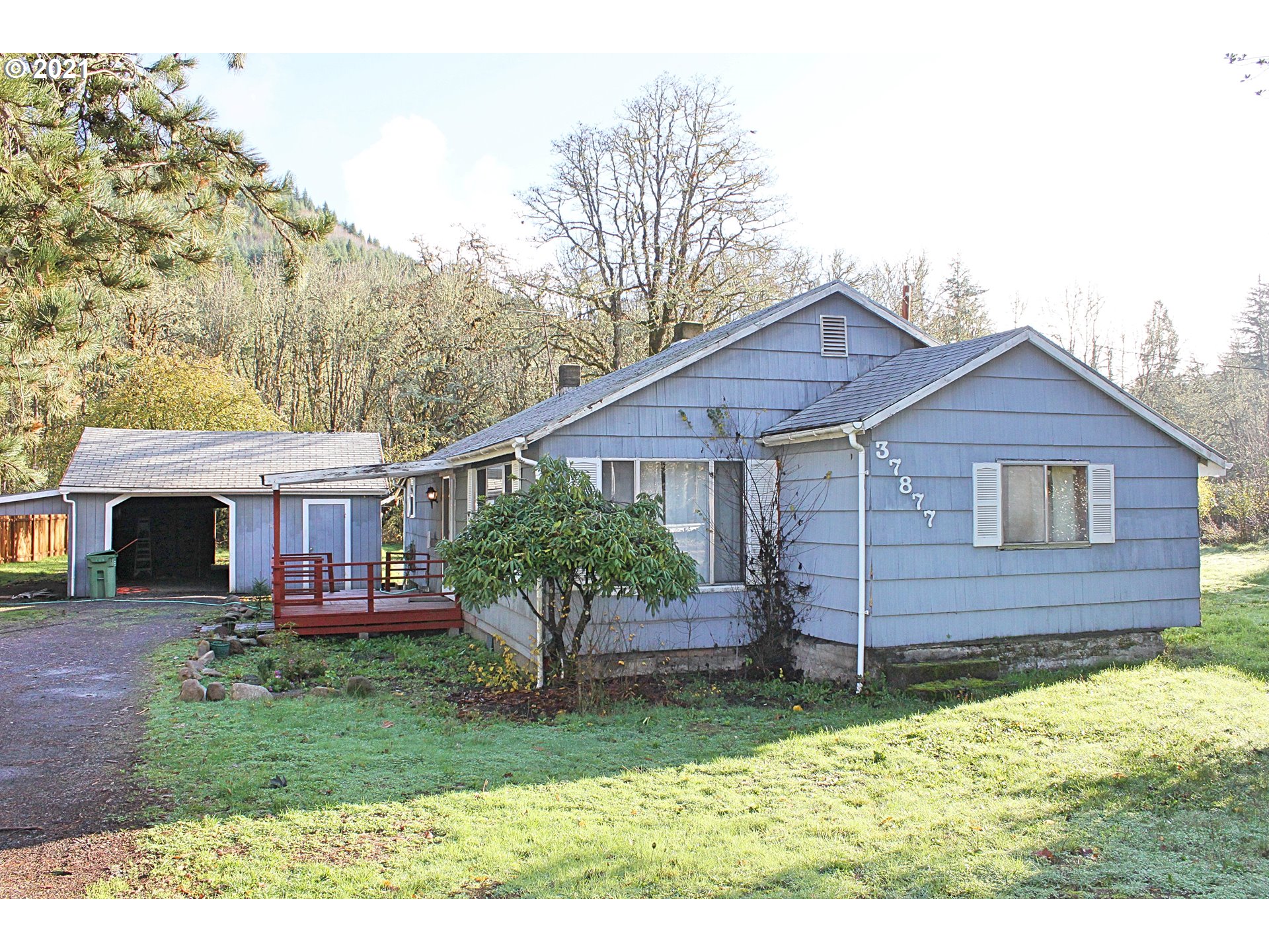 37877 Row River Road Dorena, OR 97434 - Photo 1 of 18 front view of a house with a yard