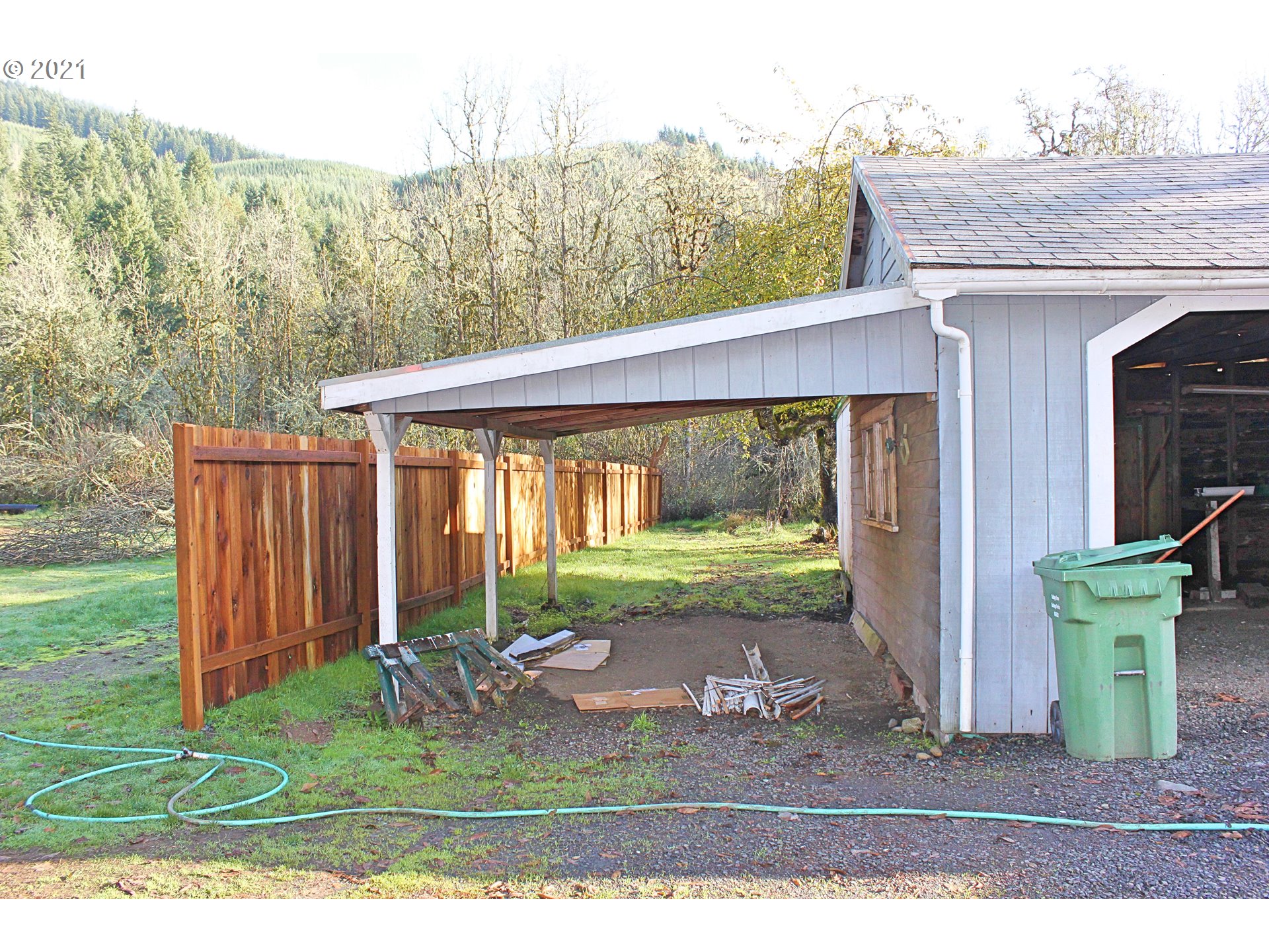 37877 Row River Road Dorena, OR 97434 - Photo 11 of 18 a view of backyard with porch and outdoor seating
