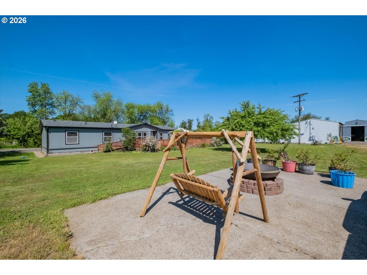 35377 Ede Road Lebanon, OR 97355 - Photo 31 of 48 a view of a backyard with sitting area