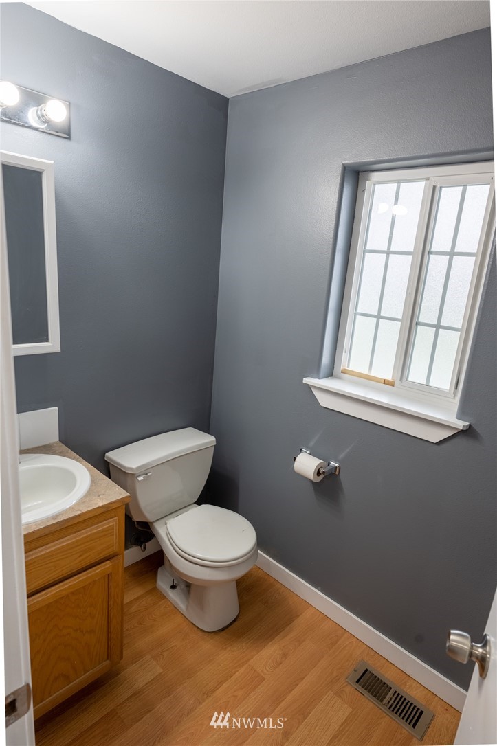 427 Rohrer Loop Sedro-Woolley, WA 98284 - Photo 14 of 36 a white toilet sitting next to a window