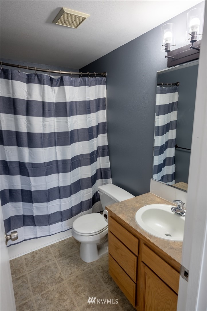 427 Rohrer Loop Sedro-Woolley, WA 98284 - Photo 21 of 36 a bathroom with a sink toilet and shower