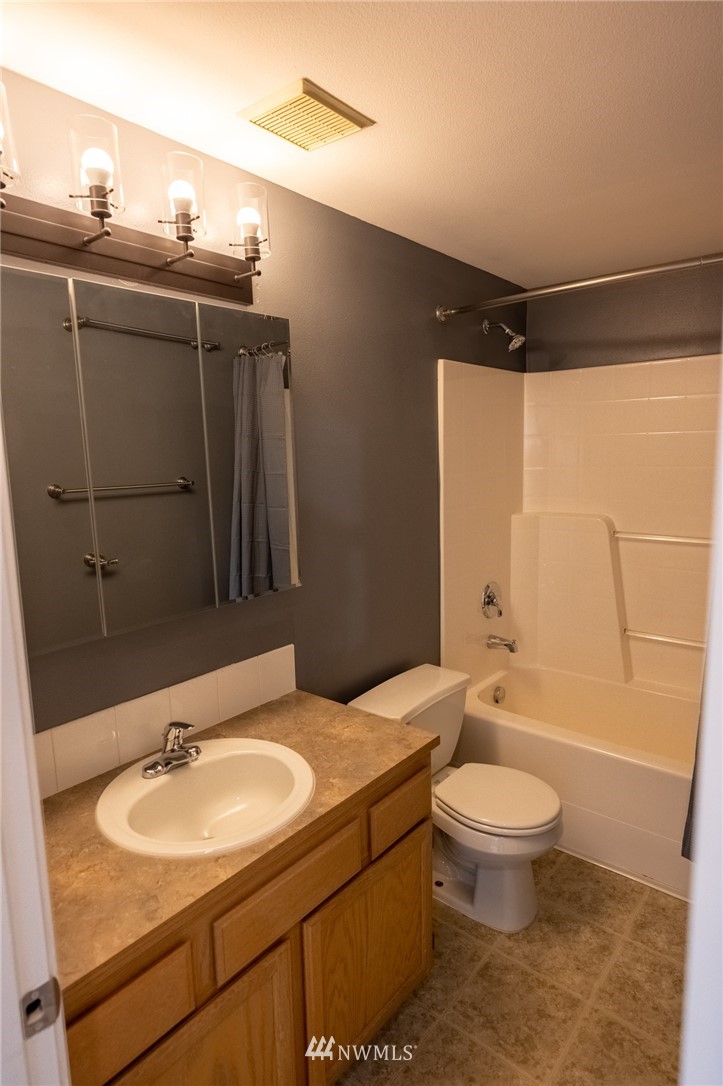 427 Rohrer Loop Sedro-Woolley, WA 98284 - Photo 26 of 36 a bathroom with a sink and a mirror