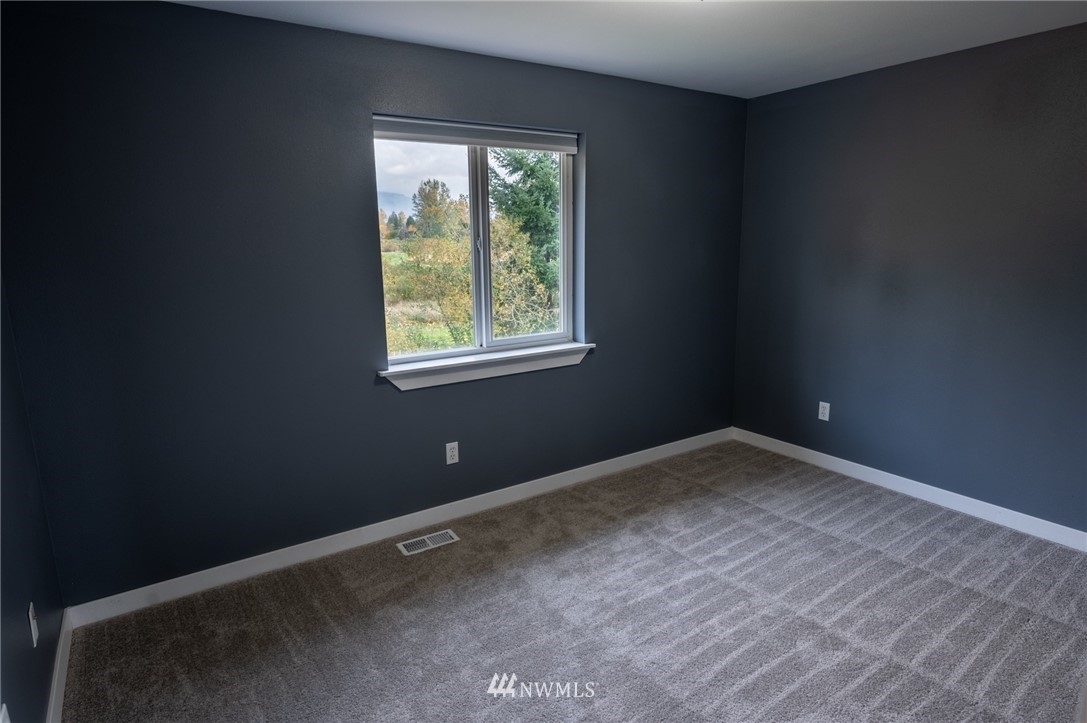 427 Rohrer Loop Sedro-Woolley, WA 98284 - Photo 29 of 36 an empty room with a window