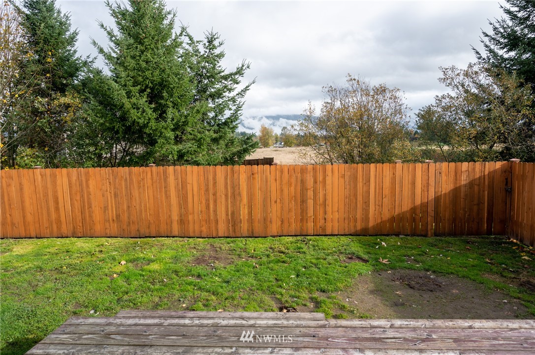 427 Rohrer Loop Sedro-Woolley, WA 98284 - Photo 35 of 36 a view of yard with wooden fence