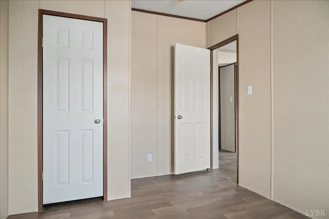 a view of a hallway with closet area