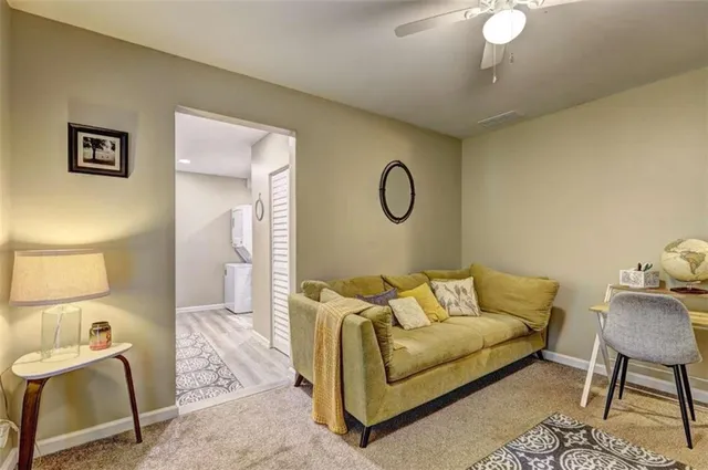 a living room with furniture and a table