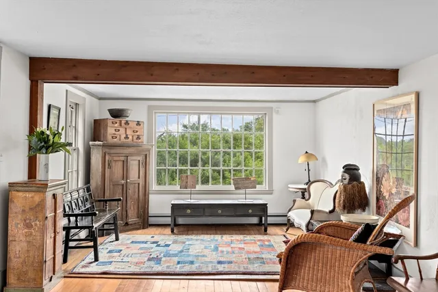 a living room with furniture and a window