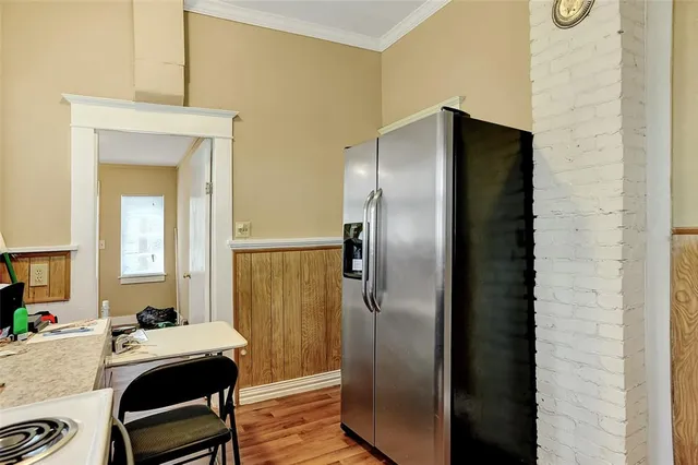 a room with a chair and a mirror