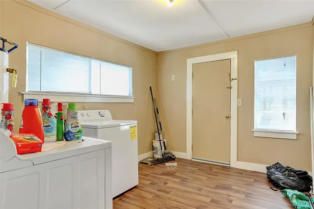 a view of a kitchen with storage and utility
