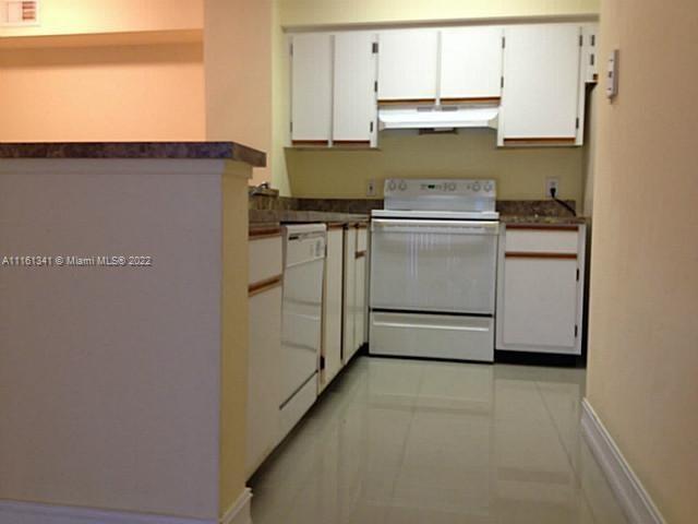 610 South Park Road, Unit 111 Hollywood, FL 33021 - Photo 7 of 7 a utility room with dryer and washer