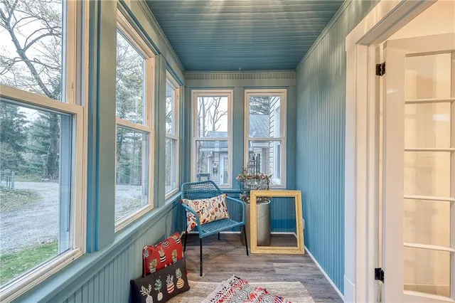 a kitchen with a refrigerator sink and cabinets