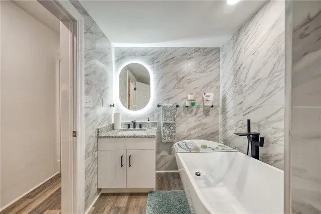 a view of a entryway with wooden floor