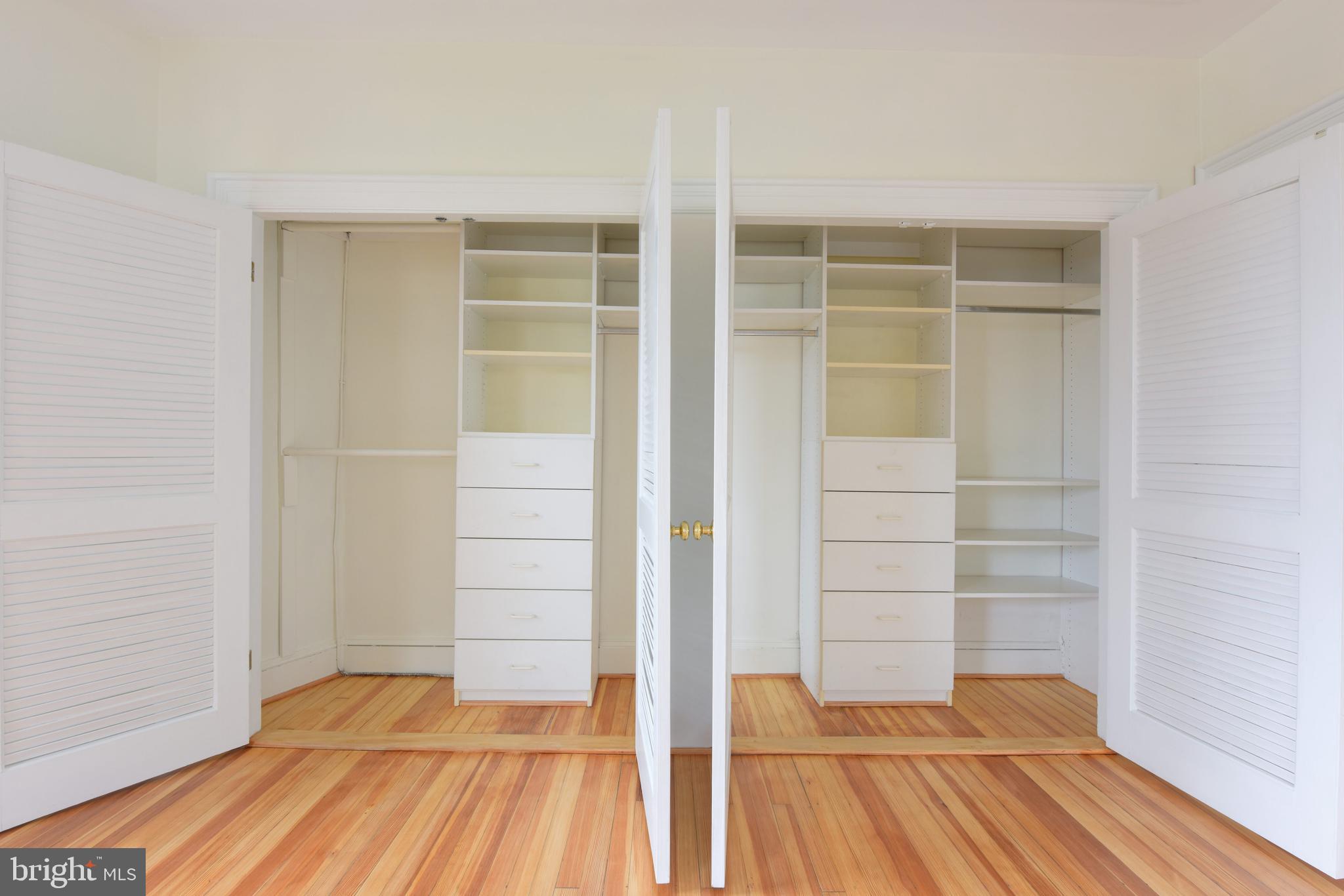 2022 Columbia Road Northwest, Unit 612 Washington, DC 20009 - Photo 18 of 29 a view of empty room with wooden floor and entryway