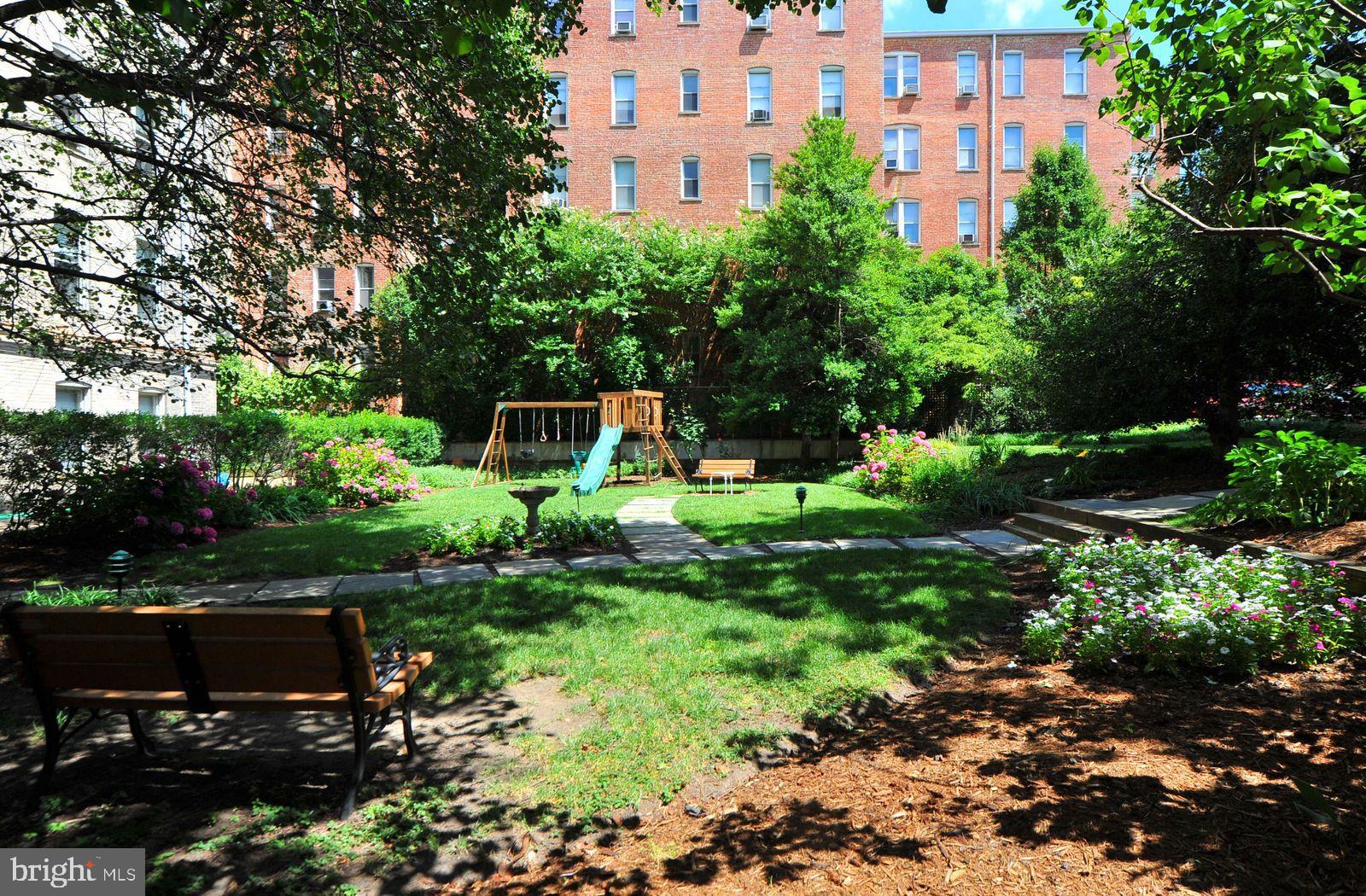 2022 Columbia Road Northwest, Unit 612 Washington, DC 20009 - Photo 21 of 29 a view of a garden with a house