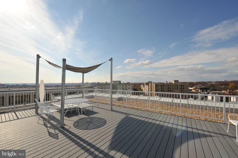 2022 Columbia Road Northwest, Unit 612 Washington, DC 20009 - Photo 22 of 29 a view of roof deck with patio