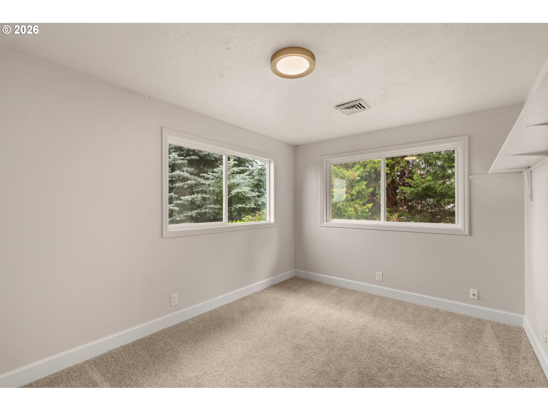1995 Greiner Street Eugene, OR 97405 - Photo 25 of 39 an empty room with windows