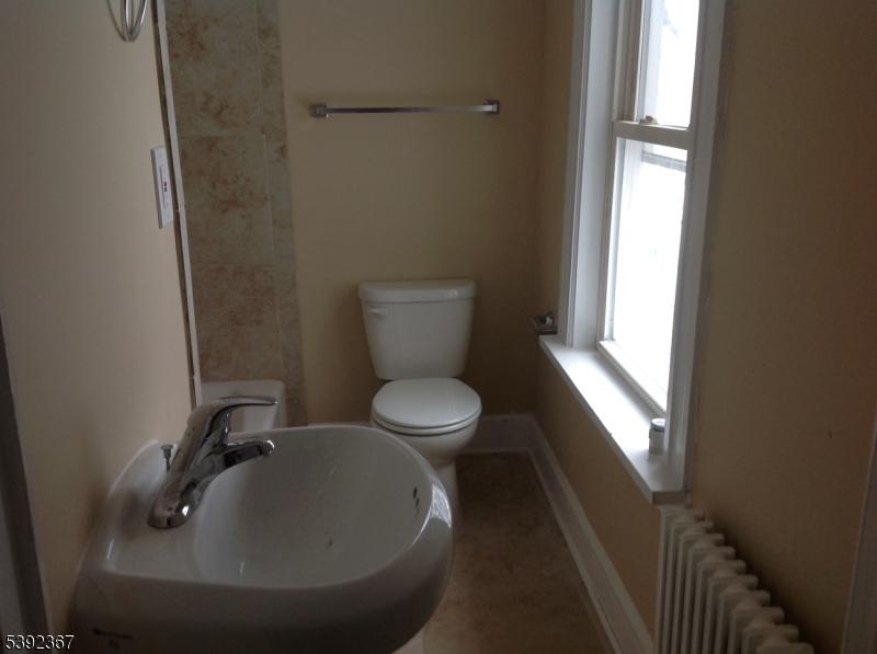 49 Wertsville Road, Unit C Hillsborough, NJ 08844 - Photo 11 of 19 a bathroom with a toilet and a sink