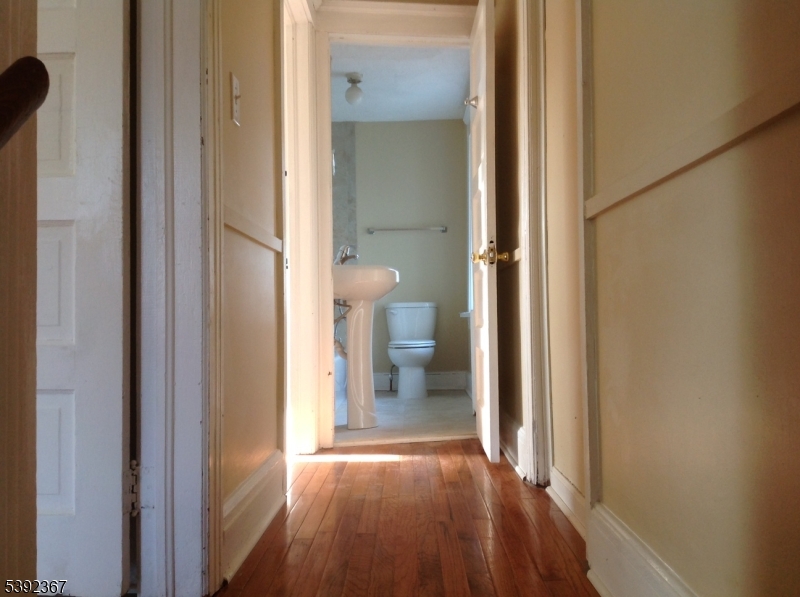 49 Wertsville Road, Unit C Hillsborough, NJ 08844 - Photo 9 of 19 a view of a bathroom from a hallway