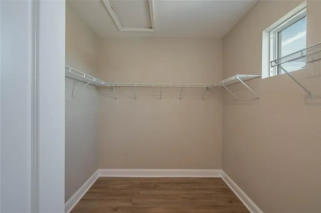 a view of an empty walk in closet