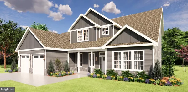 front view of a house with a yard