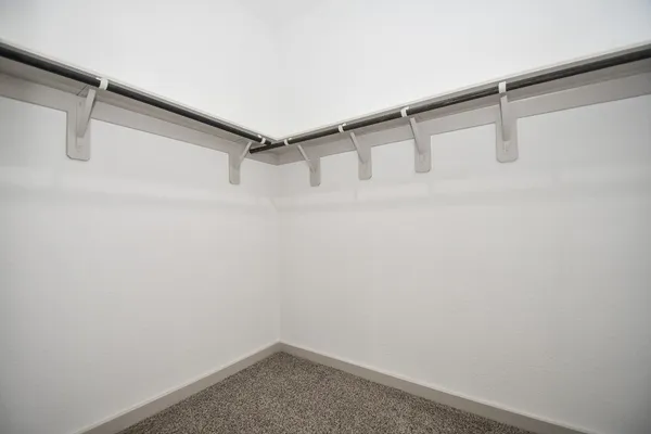 a view of a room with racks on the wall