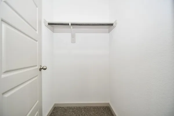 a view of small space with racks on the wall