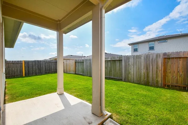 a view of a backyard with a garden