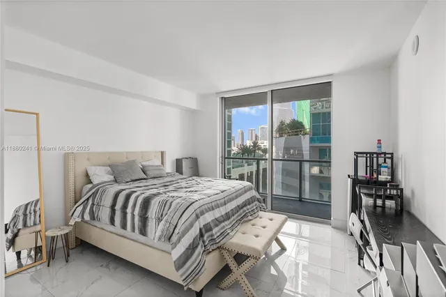 a bathroom with a double vanity sink toilet and shower
