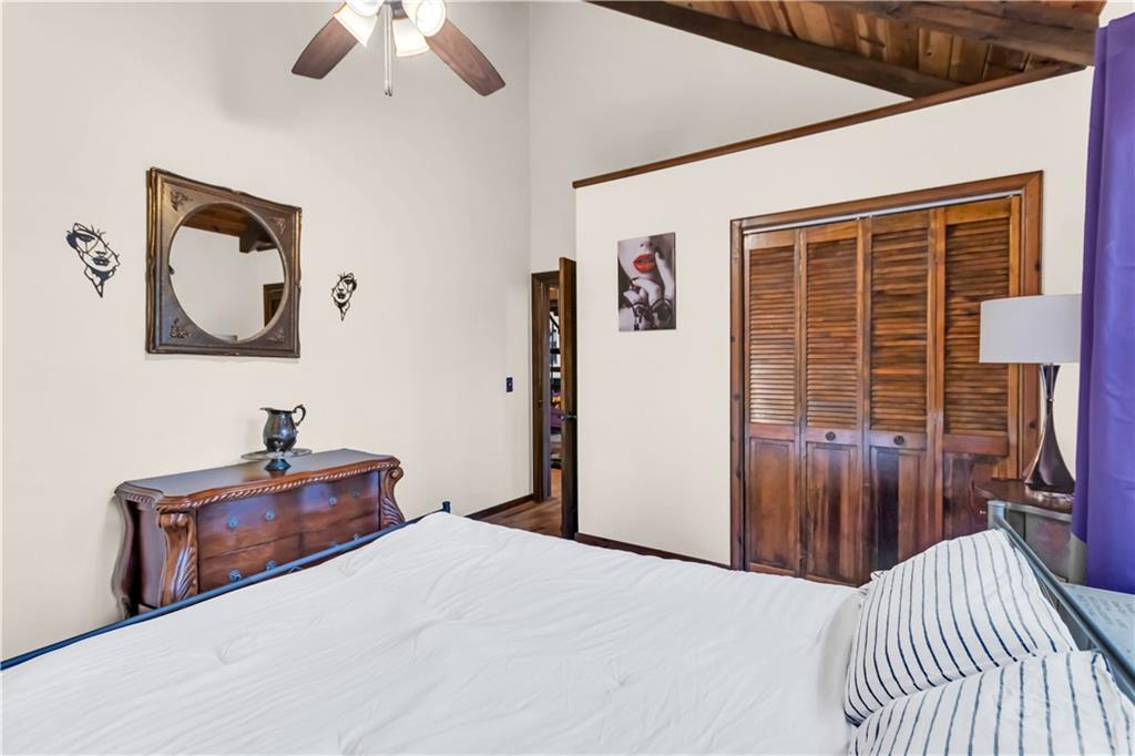 112 Old Stagecoach Road Clarkesville, GA 30523 - Photo 25 of 39 a bedroom with a bed and a large window