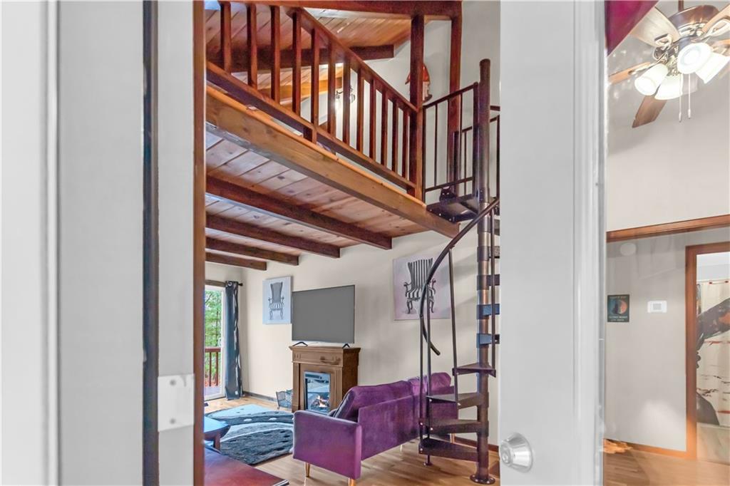 112 Old Stagecoach Road Clarkesville, GA 30523 - Photo 30 of 39 a view of entryway livingroom and hall with wooden floor