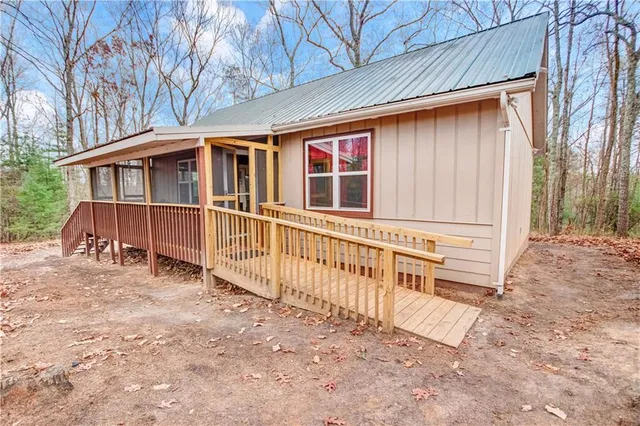 a front view of a house with a porch