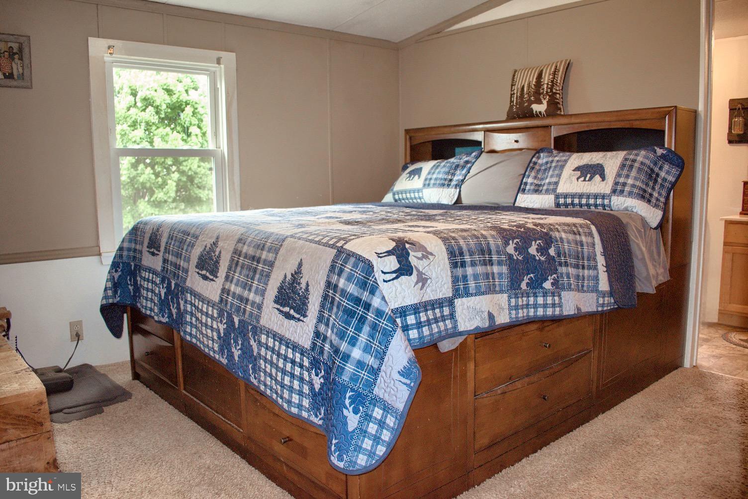202 T786 Stillwater, PA 17878 - Photo 13 of 29 a bedroom with a bed and window
