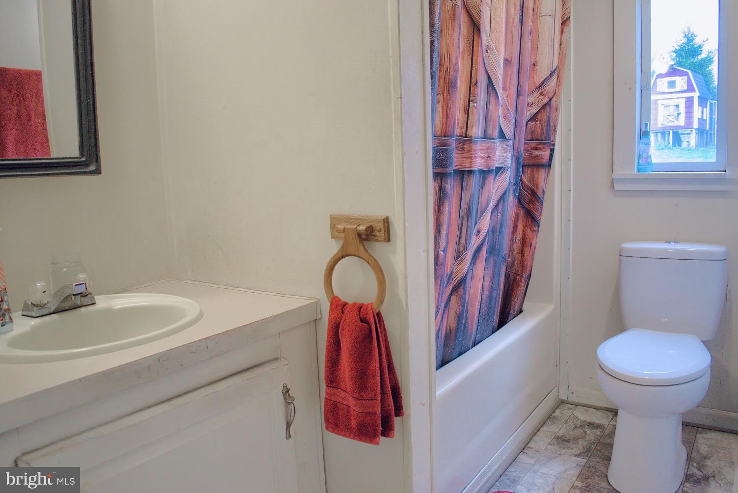 202 T786 Stillwater, PA 17878 - Photo 17 of 29 a bathroom with a toilet and a sink
