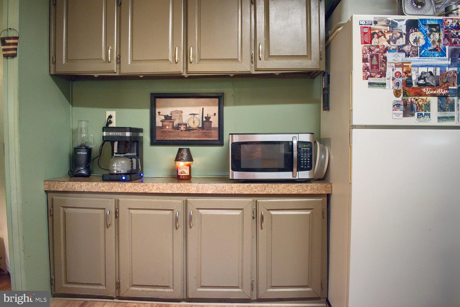 202 T786 Stillwater, PA 17878 - Photo 9 of 29 a kitchen with white cabinets and stainless steel appliances