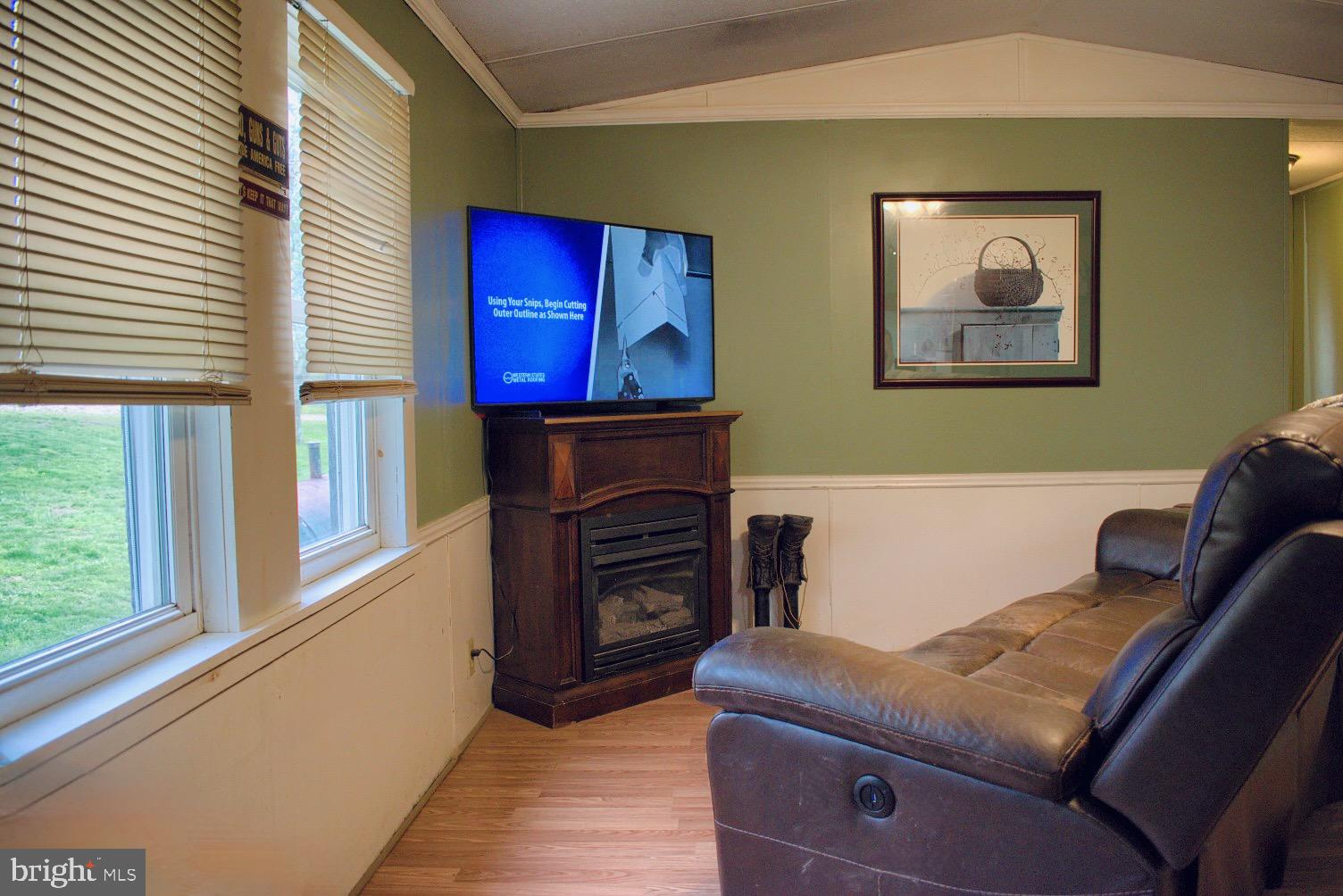 202 T786 Stillwater, PA 17878 - Photo 10 of 29 a living room with furniture and a fireplace