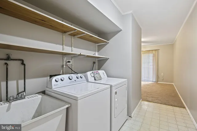 a balcony with wooden floor and fence