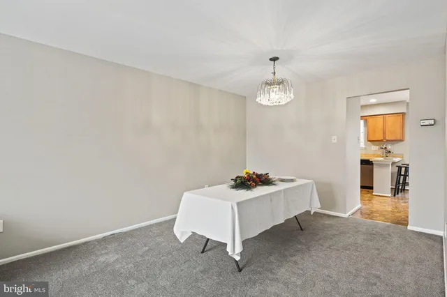 a living room with hard wood floor