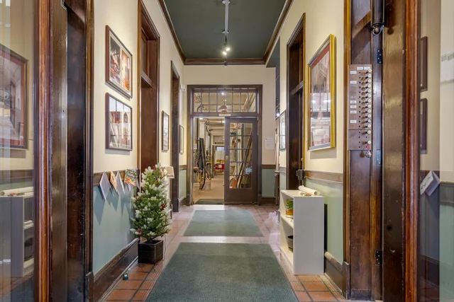 a view of a bathroom with a glass door