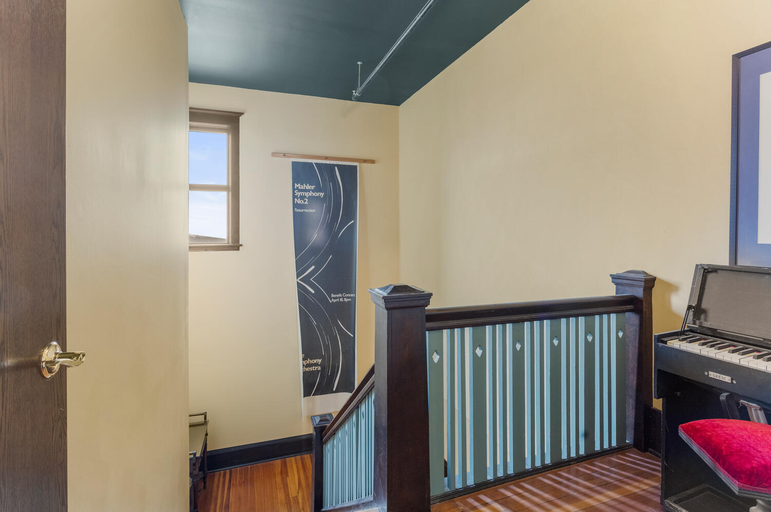 112 West Hill Street Champaign, IL 61820 - Photo 22 of 72 a view of a hallway with wooden floor and staircase