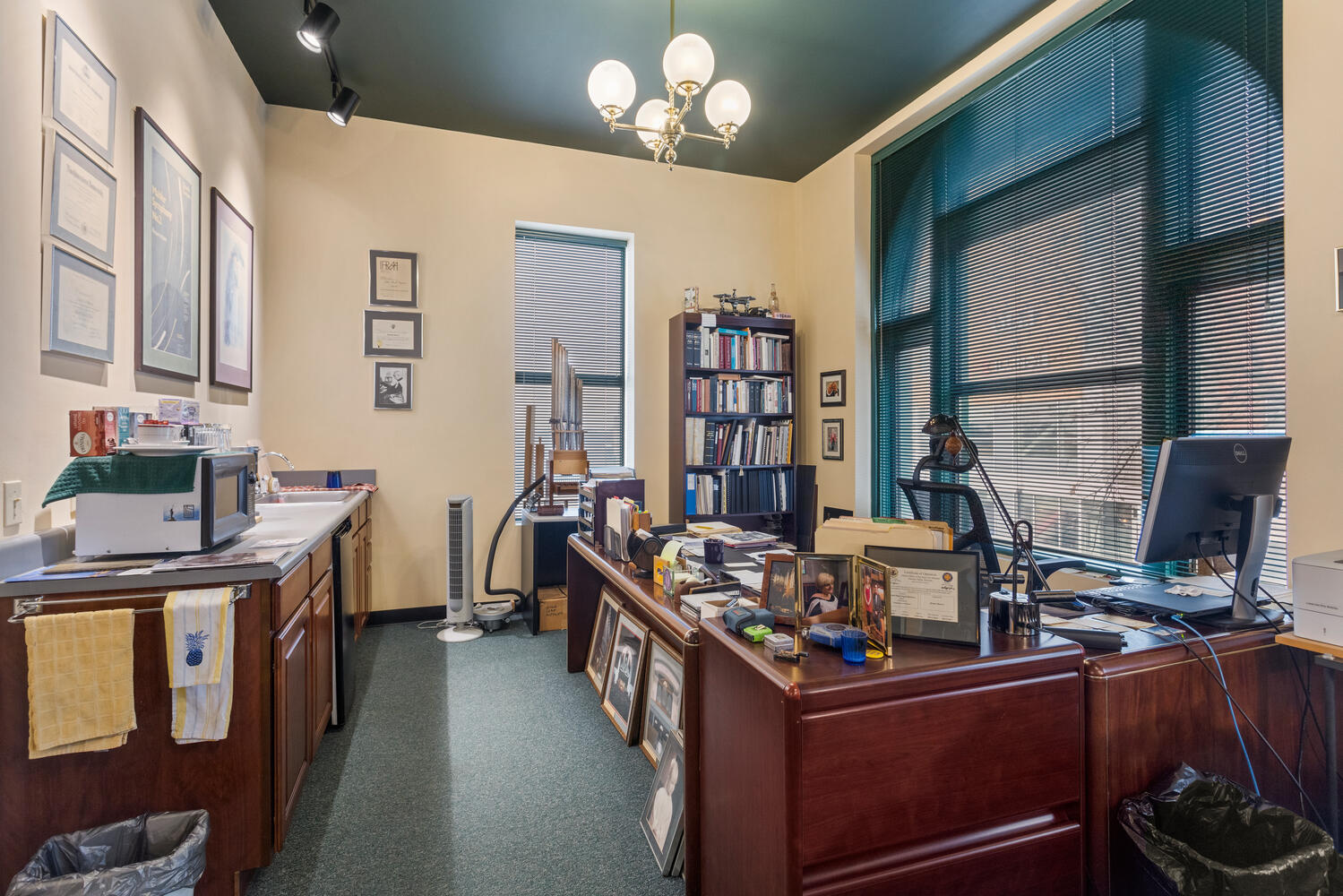 112 West Hill Street Champaign, IL 61820 - Photo 29 of 72 a kitchen with stainless steel appliances granite countertop a stove a sink dishwasher and cabinets with wooden floor