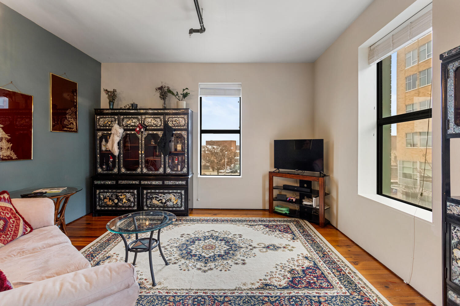 112 West Hill Street Champaign, IL 61820 - Photo 39 of 72 a living room with furniture and a flat screen tv
