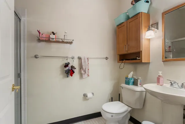 a bedroom with a bed and a table in it