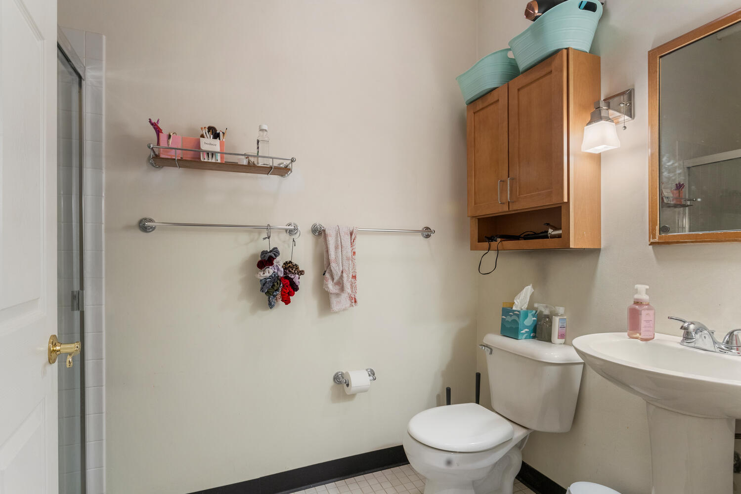 112 West Hill Street Champaign, IL 61820 - Photo 45 of 72 a bathroom with a sink mirror and toilet