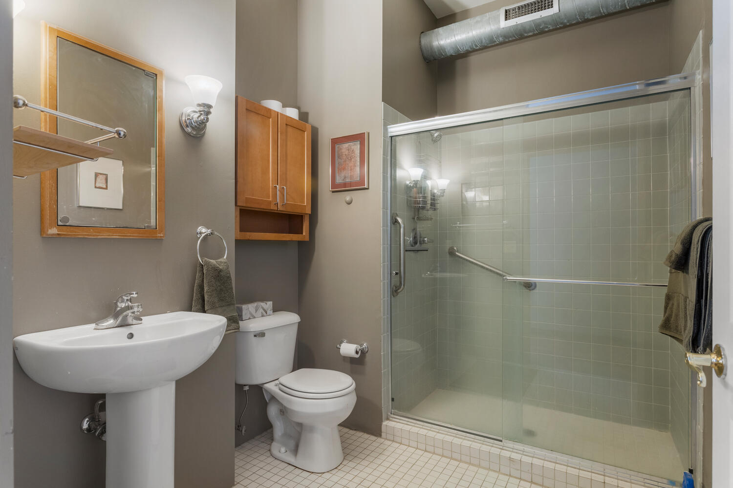 112 West Hill Street Champaign, IL 61820 - Photo 51 of 72 a bathroom with a shower sink vanity and toilet