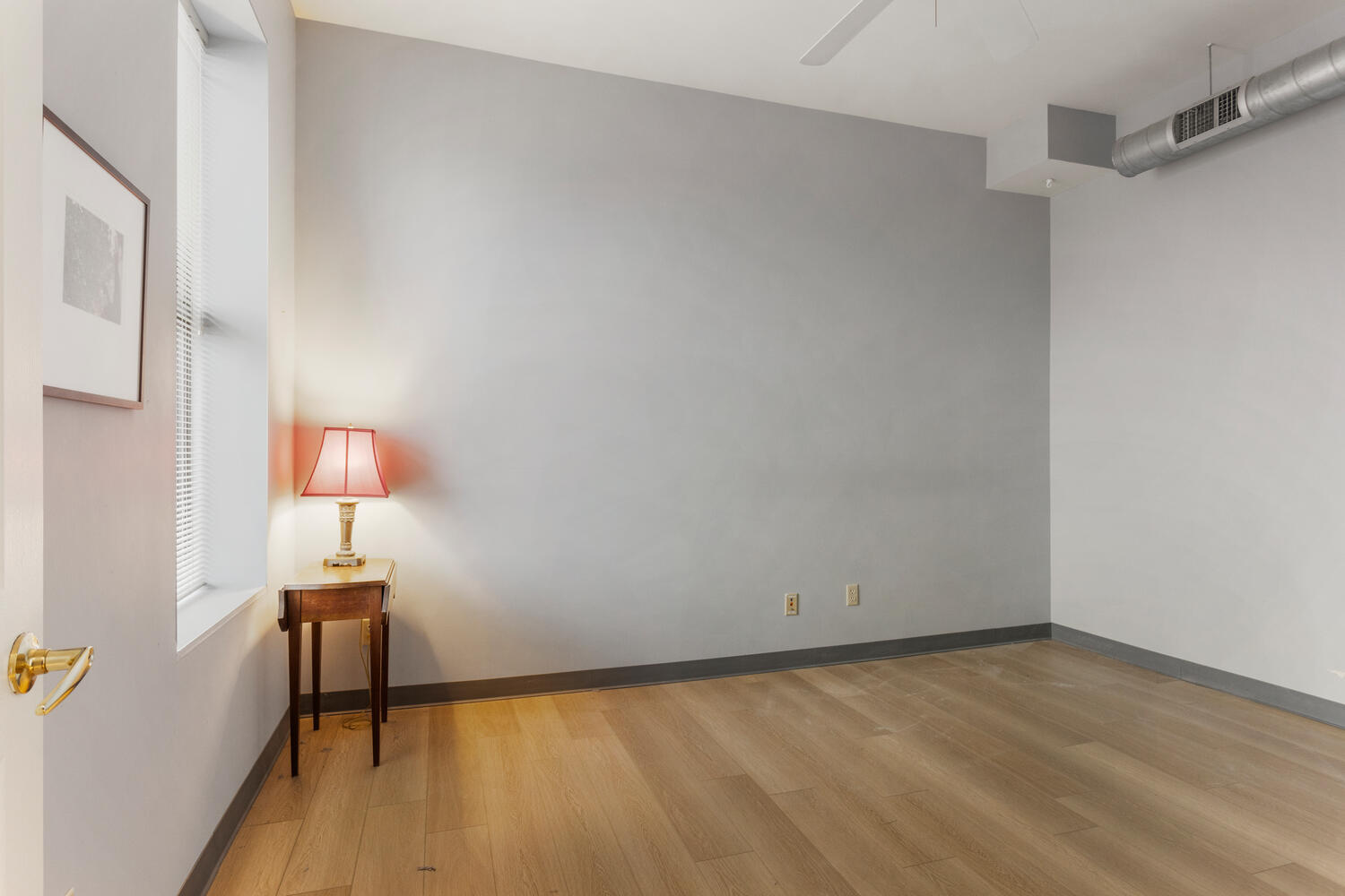 112 West Hill Street Champaign, IL 61820 - Photo 52 of 72 a view of a room with wooden floor and bench